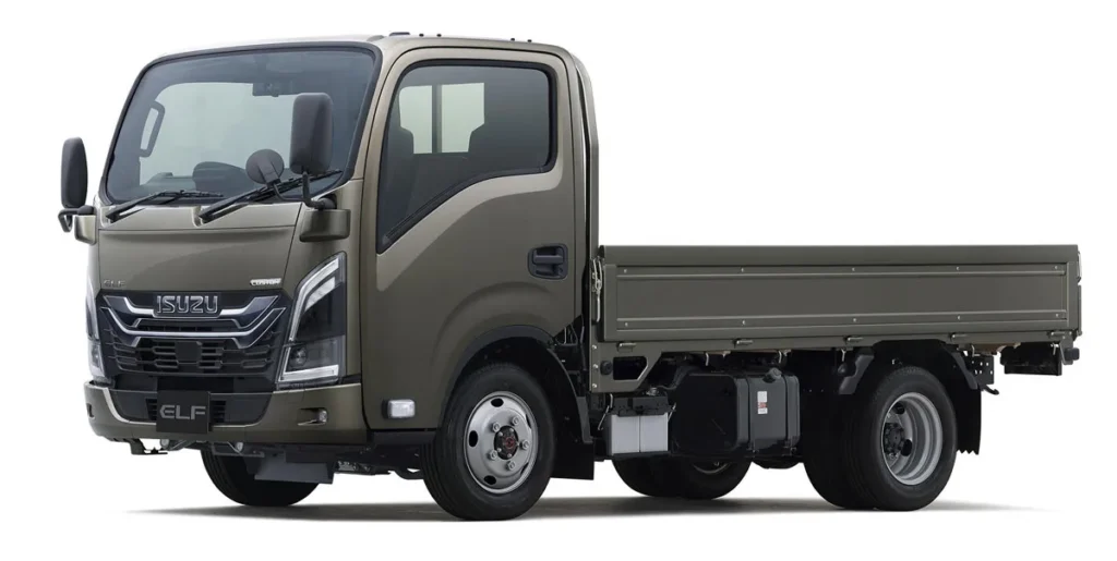 Isuzu ELF light-duty truck with olive-green cab and long flatbed cargo area